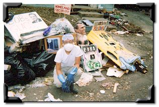 Laura in hazmat gear after Katrina.